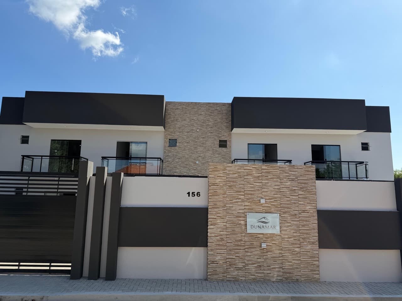 Completed facade and entrance of the DunaMar development in Paracuru.